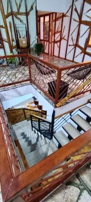 an overhead view of a room with a table and stairs at Four Elements House Peace & Nature in Monteverde in Monteverde Costa Rica