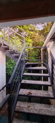 a set of stairs leading up to a building at Four Elements House Peace & Nature in Monteverde in Monteverde Costa Rica
