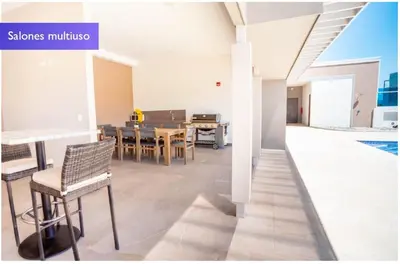 a dining room with a table and chairs at 1702 Torres los Yoses cozy apartment on the 17th floor with balcony in San José