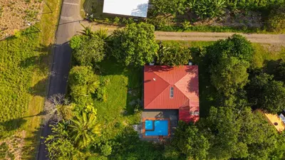 an overhead view of a house with a red roof at Casa Los Chorros in Agua Azul
