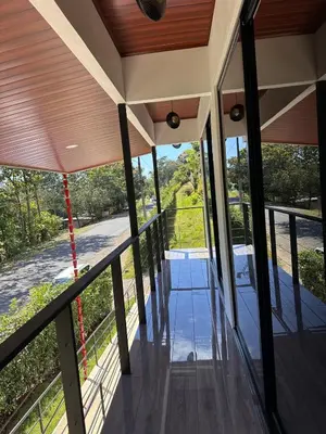 a view from the balcony of a house at Hospedaje Quepos Tardes Doradas in Quepos