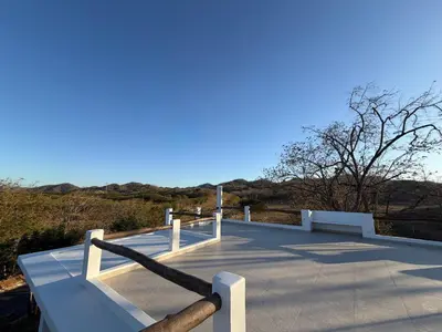 a ramp with a railing on top of a building at Villa Sol Kite House in La Cruz