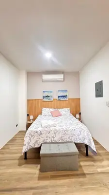 a bedroom with a bed in a room at GZ Suites in Coco