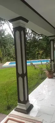 a porch with a black and white gazebo at Casa Pura vida in Ojochal