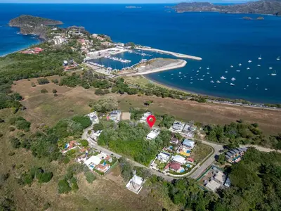an aerial view of an island with a harbor at Flamingo Oasis in Playa Flamingo