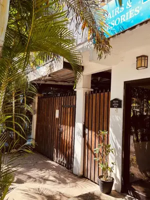 a entrance to a building with a wooden gate at Casa Mia in Sámara