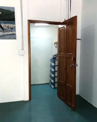 an open door in a room with a door at Ojochal, Costa Rica artist owned property in Ciudad Cortés