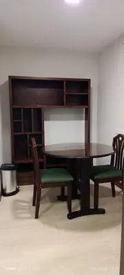 a dining room table with two chairs and a desk at Apartamento céntrico San jose in San José