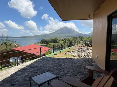 a view of a mountain from the porch of a house at Cabin Casove in El Castillo de La Fortuna