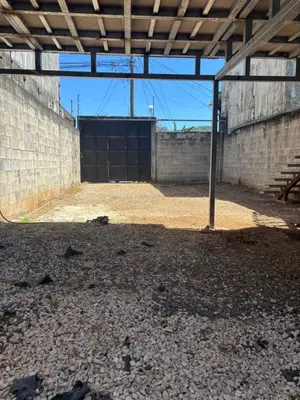 an empty room with a large door in a building at Apartment near from Airport in Guardia