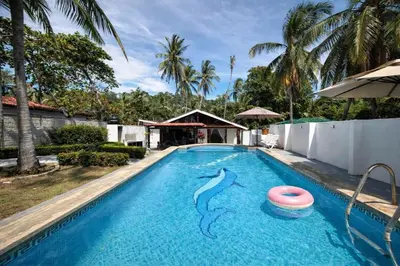 a swimming pool with a frisbee in the middle at Paradise in Tivives