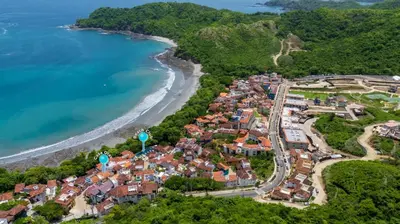 an aerial view of a town next to the beach at LC Casa Olas in Playa Danta