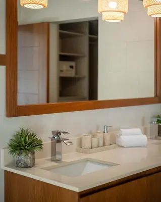 a bathroom counter with a sink and a mirror at Luxury 3BR Gated Villa - Private Pool in Tamarindo in Tamarindo