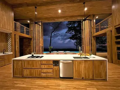 a large kitchen with a large island in a room at The Zen, Award-Winning Sanctuary in Uvita in Uvita