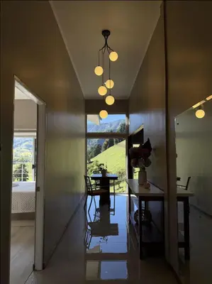 a dining room with a table and a window at Casa Hortensias in Bajos del Toro