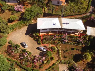 an overhead view of a house with a garden at La Princesa Hotel in San Isidro