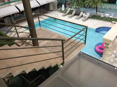 an overhead view of a swimming pool with a pool at Hotel Vista De Golf, San Jose Aeropuerto, Costa Rica in San José