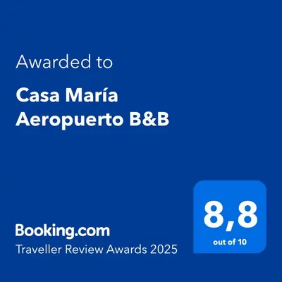 a screenshot of a cell phone with the text awarded to casa marinaapa at Casa María Aeropuerto B&B in Alajuela City