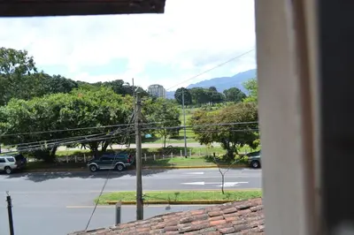 a view from a window of a parking lot at Hotel Columbus in San José