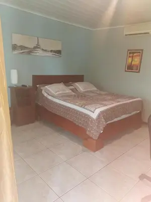 a bedroom with a bed in a room at Hotel Vale's in Chiles