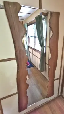 a mirror in a room with a window at Forest Garden House in Monteverde Costa Rica