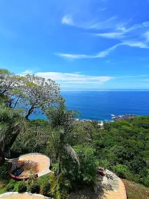 a view of the ocean from the top of a hill at Montezuma Heights in Montezuma