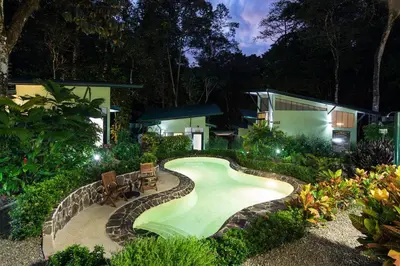 a house with a swimming pool in the yard at Yaba Chigui Lodge in Ojochal