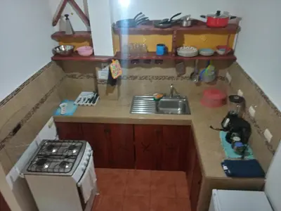 a toy kitchen with a stove and a sink at Blanconejo de Montezuma in Montezuma