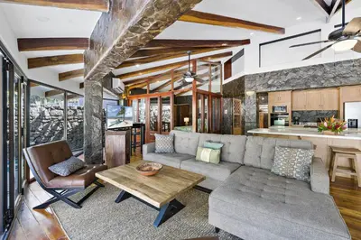a living room with a couch and a table at Playa Potrero - beachfront Villa, big private pool - Casa Bella Catalina in Potrero