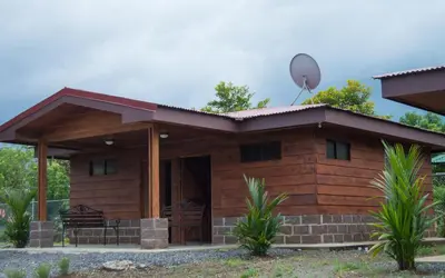 a house with a satellite on the roof at Cabañas San Isidro in Ángeles