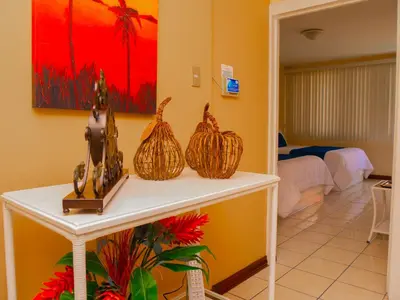 a room with a table with some items on it at Hotel Bamboo Aeropuerto in Alajuela City