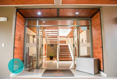a hallway with a staircase in a house at Hotel Terra Viva in Quesada