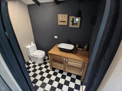 a bathroom with a sink and a toilet at Uvita Bali Bosque Retreat in Uvita