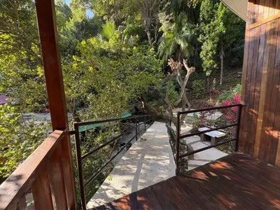 a walkway leading to a porch of a house at Casa Susen in Montezuma