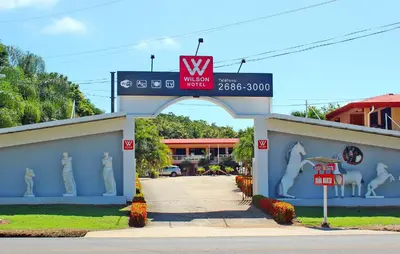 an entrance to a wissen mall with a sign on it at Hotel Doña Marta in Nicoya