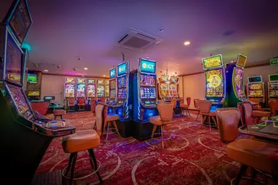 a casino with a bunch of slot machines at Holiday Inn San Jose La Sabana by IHG in San José