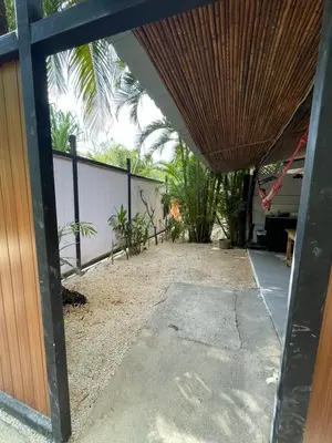 a view of a patio with a wooden roof at Beach Cabinas in Santa Teresa Beach
