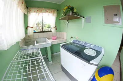 a small kitchen with a stove and a sink at Casa la Fortuna 1 in Fortuna