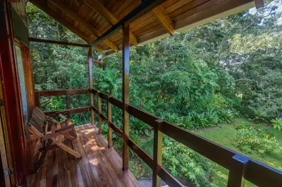 a view from the porch of a tree house at Cabañas Valle Campanas - Monteverde, Costa Rica in Monteverde Costa Rica