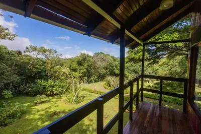 a view from the porch of a tree house at Cabañas Valle Campanas - Monteverde, Costa Rica in Monteverde Costa Rica