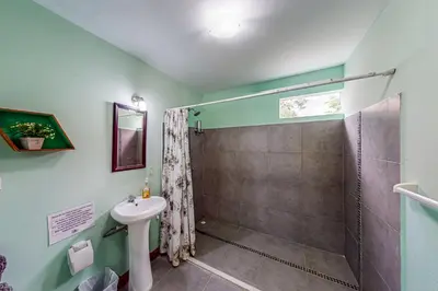 a bathroom with a shower and a sink at Nueva Villa Paraíso Four Villas in Lagunillas
