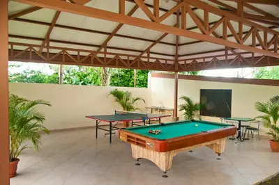 a pool room with two ping pong tables at Condo's Vista Al Volcan in Fortuna