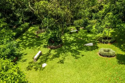 an overhead view of a garden with rocks and trees at La Terraza Guest House B&B in Grecia
