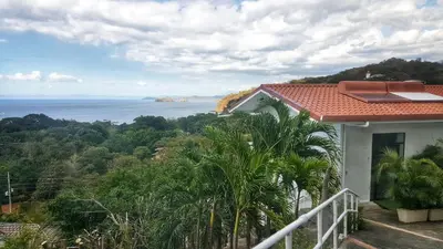 a house with a view of the ocean at Pura Vista Hotel in Ocotal