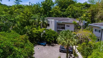 an aerial view of a house with a parking lot at Elan at Ballena Beach in Uvita