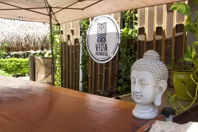 a white statue sitting on top of a table at Vida Hermosa in Playa Hermosa