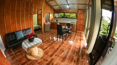an aerial view of a living room and kitchen in a house at Cabañas del Lago in Fortuna