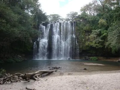 a waterfall in the middle of a body of water at Hostel Dodero in Liberia