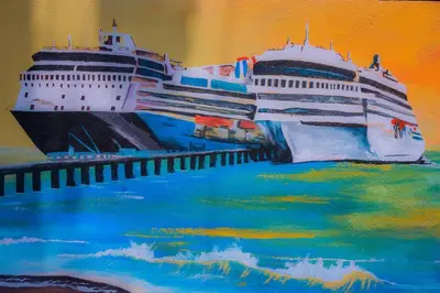 a painting of a cruise ship at a dock at Hotel Sol Puntarenas in Puntarenas
