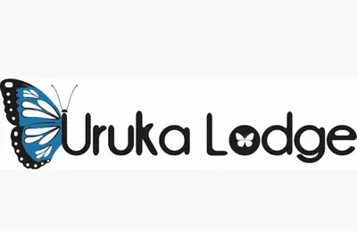a butterfly with the words uka lodge at Uruka Lodge in Alajuela City
